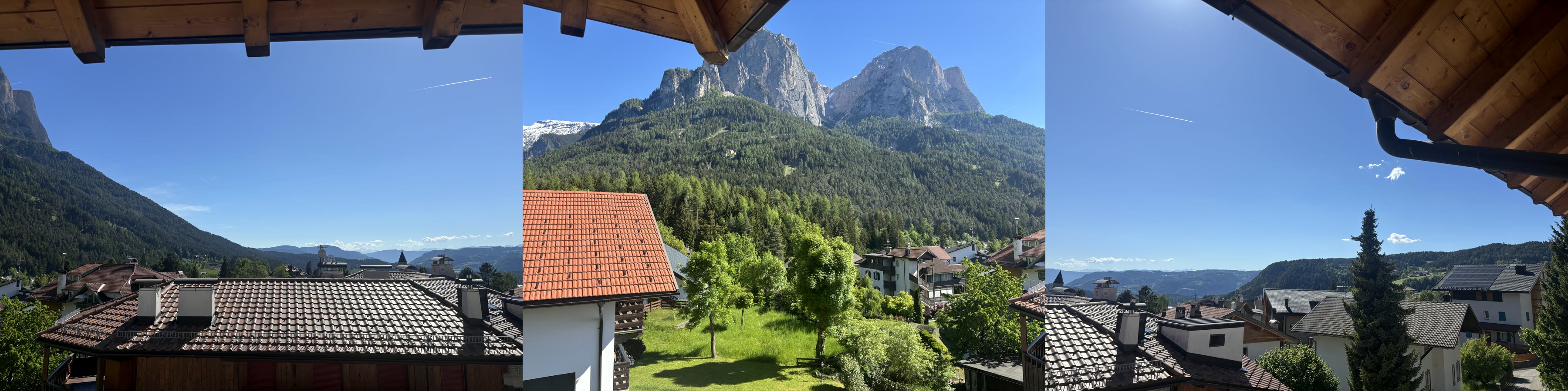 Zusammengesetzter Panoramablick vom Balkon über Seis, Schlern und Dolomiten